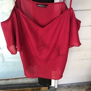 Red off the shoulder shirt